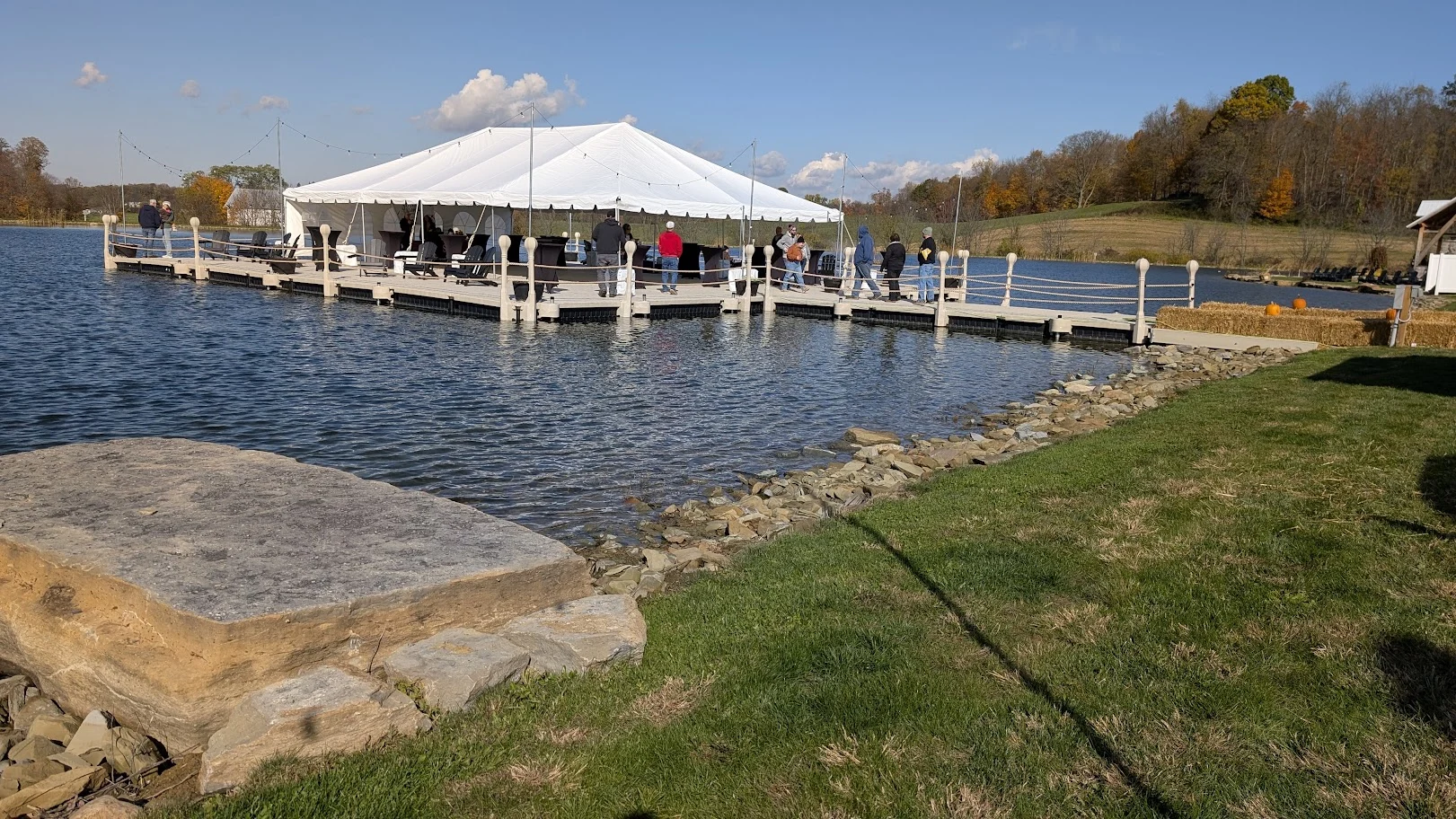 Guests gather on the platform during the winery and food grand opening.