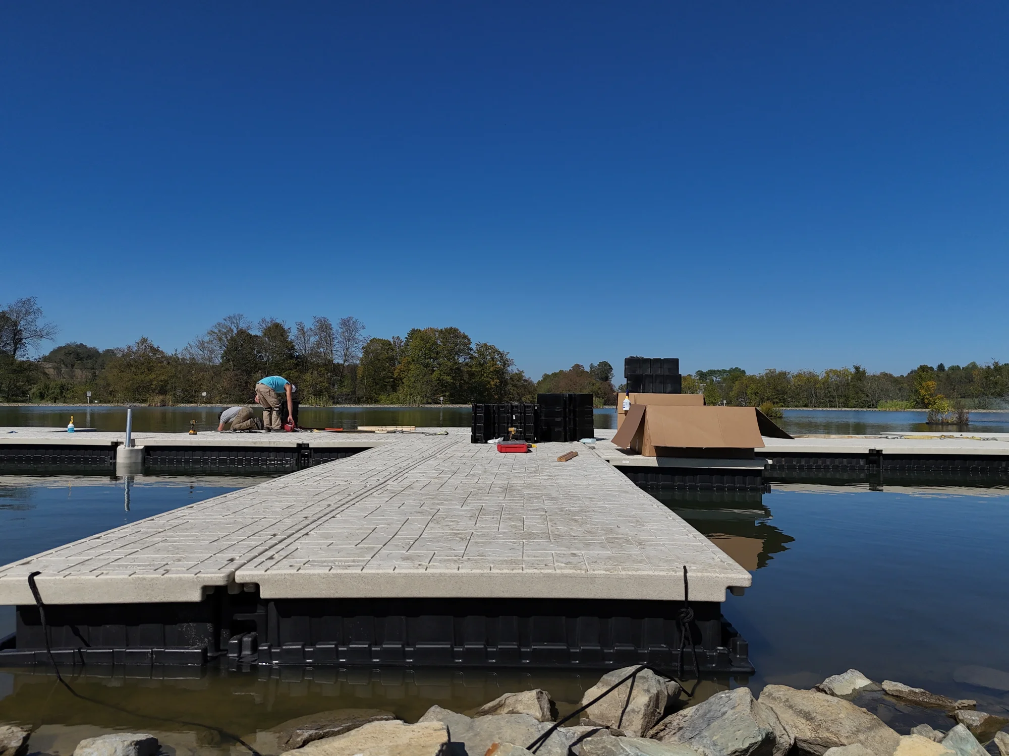 Dock sections taking shape at the shore during installation.