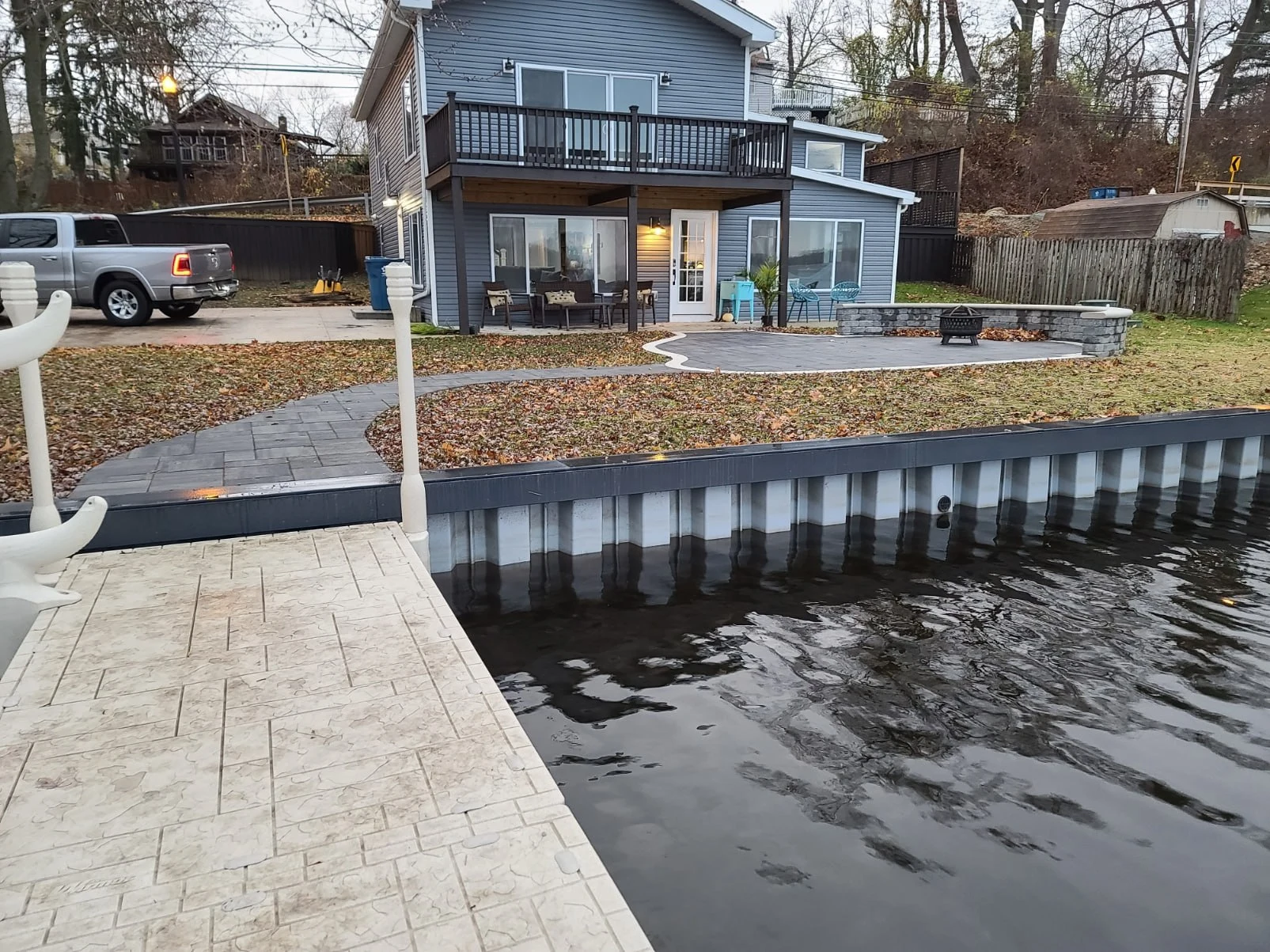 Finished seawall and Wave Armor dock in front of Landmark Lakehouse on Long Lake