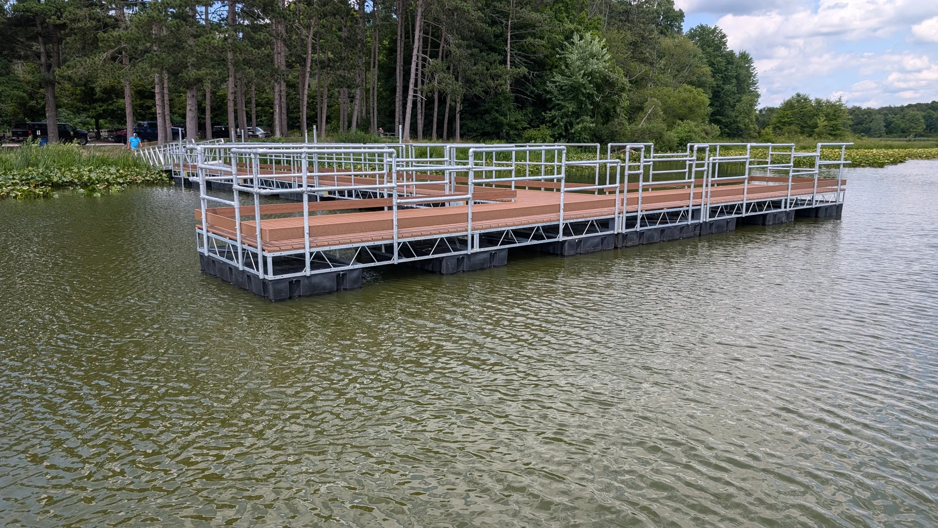 The finished fishing platform with railings, decking and floats at Mogadore Reservoir.