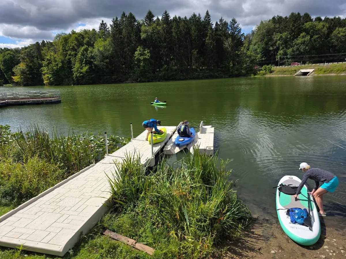 Paddlers using the dock and kayak launch at Mogadore Reservoir