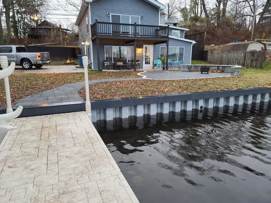 Landmark Lakehouse shoreline with seawall and connected dock
