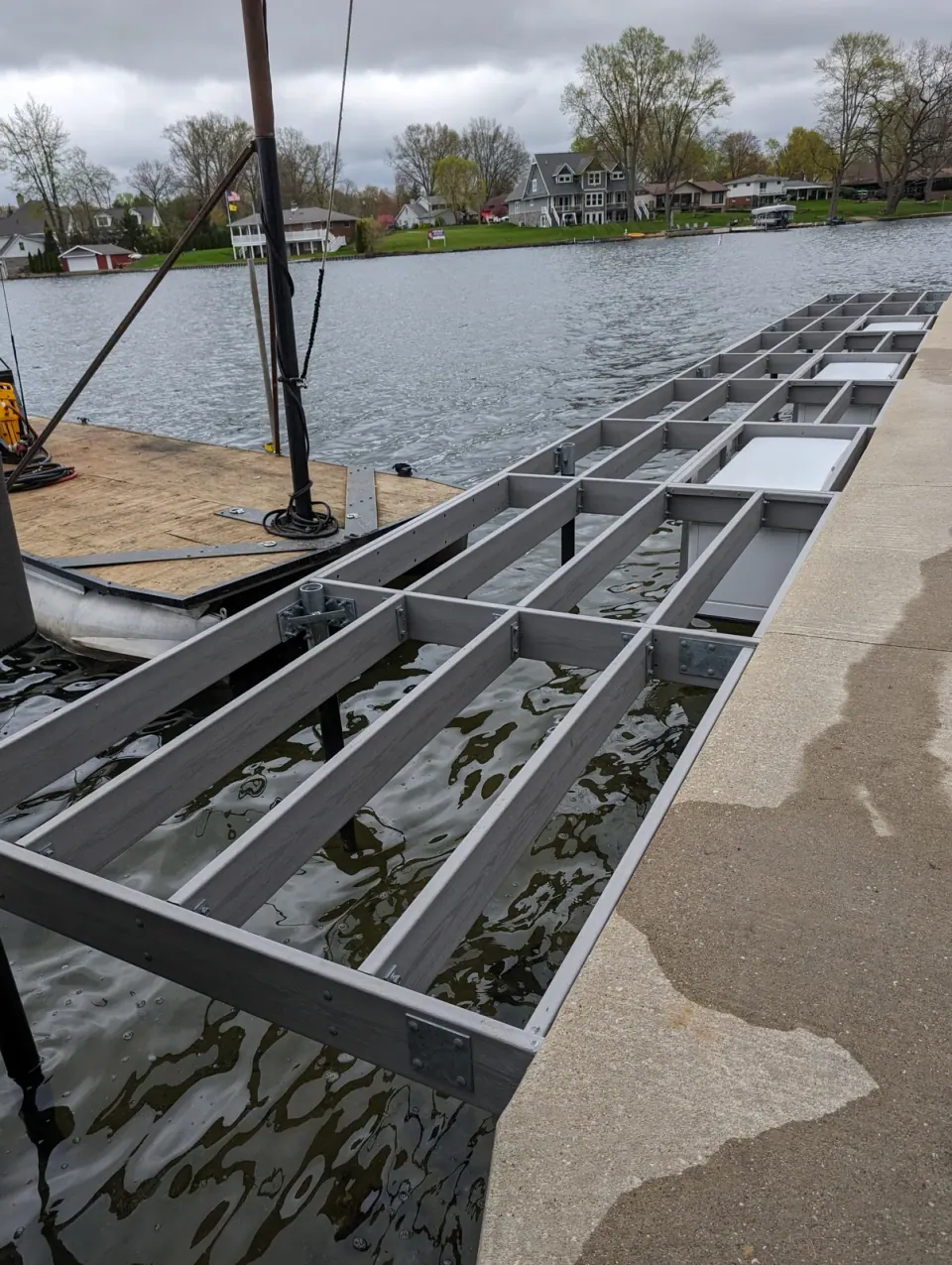 The dock framing running alongside the shoreline before decking was installed.